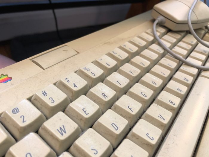 Ancient, grimy-looking Mac keyboard from the 1990s.